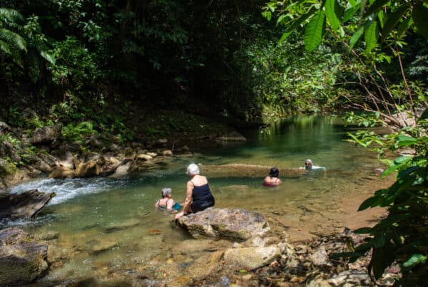 swimming near waterfall in Trinidad